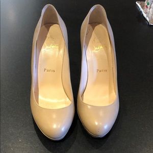 Christian Louboutin Leather Round-Toe Pumps!